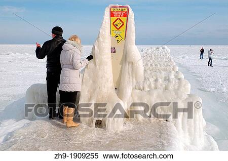 Icy pier, frozen Black Sea, a rare phenomenon, last time it occured in 1977, Odessa, Ukraine, Eastern Europe View Large Photo Image Stock Photography - Icy pier, frozen Black Sea, a rare phenomenon, last time it occured in 1977, Odessa, Ukraine, Eastern Europe. Fotosearch