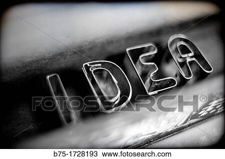 Stock Image - idea, texto, mensaje escrito dentro de una caja, idea, text, message written inside a box. Fotosearch