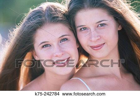 Identical twins View Large Photo Image Picture - Identical twins. Fotosearch