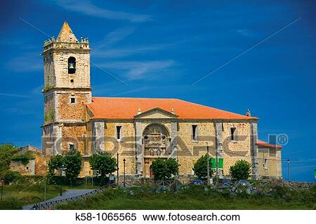 Iglesia parroquial de San JuliBn y Santa Basilisa, Isla, Cantabria, Northern Spain View Large Photo Image Stock Photography - Iglesia parroquial de San JuliBn y Santa Basilisa, Isla, Cantabria, Northern Spain. Fotosearch
