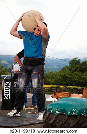 Ignacio Perurena, Harrijasotzaile (stone lifting), Basque rural sport, Aduna, Gipuzkoa, Basque Country, Spain View Large Photo Image Stock Photo - Ignacio Perurena, Harrijasotzaile (stone lifting), Basque rural sport, Aduna, Gipuzkoa, Basque Country, Spain. Fotosearch