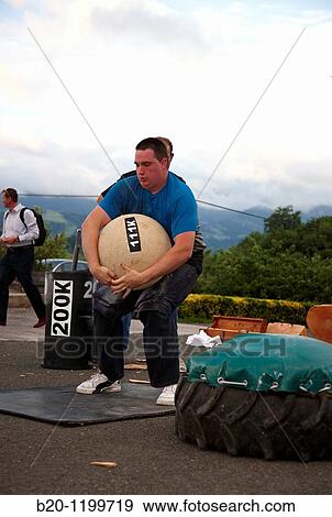 Ignacio Perurena, Harrijasotzaile (stone lifting), Basque rural sport, Aduna, Gipuzkoa, Basque Country, Spain View Large Photo Image Stock Photo - Ignacio Perurena, Harrijasotzaile (stone lifting), Basque rural sport, Aduna, Gipuzkoa, Basque Country, Spain. Fotosearch