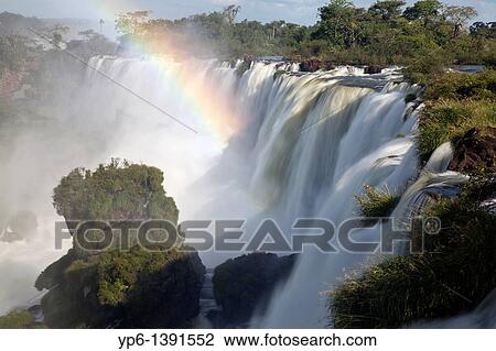 Stock Image - Iguazu Falls with rainbow, Iguazu National Park, Argentina. Fotosearch