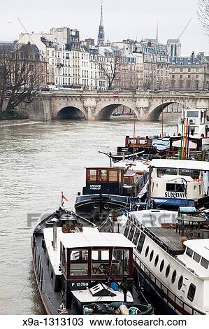 Ile de la Cite and the River Seine with Barges. Paris, France. View Large Photo Image Stock Image - Ile de la Cite and the River Seine with Barges. Paris, France.. Fotosearch