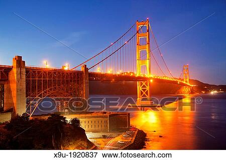 illuminated Golden Gate bridge and Fort Point National Historic Site in San Francisco, California, United States of America, USA View Large Photo Image Stock Photo - illuminated Golden Gate bridge and Fort Point National Historic Site in San Francisco, California, United States of America, USA. Fotosearch