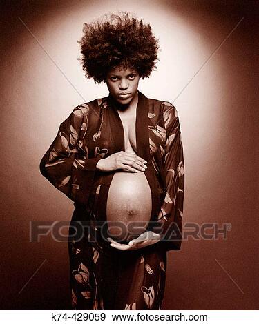 Image of Pregnant African American Woman View Large Photo Image Stock Photo - Image of Pregnant African American Woman. Fotosearch