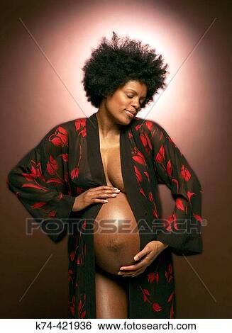 Stock Photograph - image of pregnant African American woman. Fotosearch