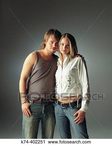 image of young couple embracing View Large Photo Image Stock Image - image of young couple embracing. Fotosearch
