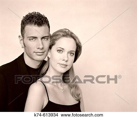 image of young couple looking at viewer View Large Photo Image Picture - image of young couple looking at viewer. Fotosearch