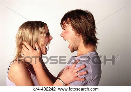 image of young couple screaming at each other View Large Photo Image Stock Image - image of young couple screaming at each other. Fotosearch