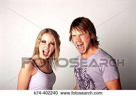 Stock Image - image of young couple screaming. Fotosearch
