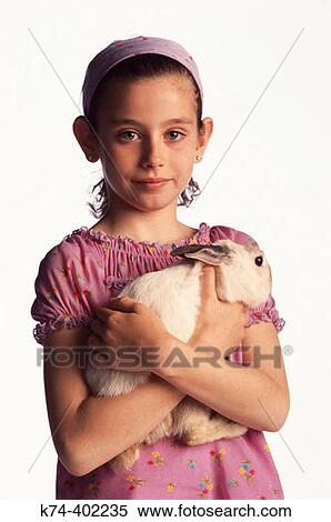 image of young girl with bunny rabbit View Large Photo Image Stock Photography - image of young girl with bunny rabbit. Fotosearch