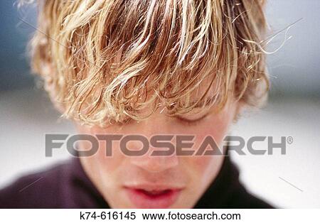 image of young man looking down View Large Photo Image Stock Photography - image of young man looking down. Fotosearch