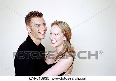 image of young smiling couple View Large Photo Image Stock Photography - image of young smiling couple. Fotosearch