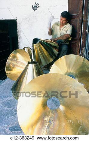 Imperial City handcraft working on copper. North Fes. Morocco. View Large Photo Image Stock Photo - Imperial City handcraft working on copper. North Fes. Morocco.. Fotosearch