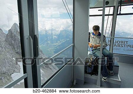 In the cable-car to Zugspitze, Alpen, Wetterstein, Ehrwald, Tirol. Austria. View Large Photo Image Picture - In the cable-car to Zugspitze, Alpen, Wetterstein, Ehrwald, Tirol. Austria.. Fotosearch
