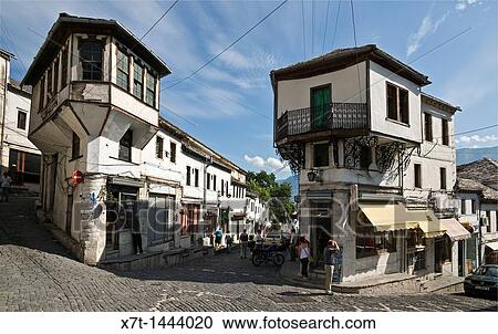 In the centre of the bazaar area of Gjirokastra in southern Albania with its old ottoman influenced houses View Large Photo Image Stock Image - In the centre of the bazaar area of Gjirokastra in southern Albania with its old ottoman influenced houses. Fotosearch