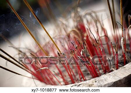 Incense sticks burning at the Hoa Lu temple near Ninh Binh in northern Vietnam View Large Photo Image Stock Photo - Incense sticks burning at the Hoa Lu temple near Ninh Binh in northern Vietnam. Fotosearch