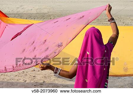 India, Bihar, Sonepur, Women drying sarees. View Large Photo Image Stock Image - India, Bihar, Sonepur, Women drying sarees.. Fotosearch