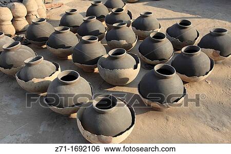 India, Rajasthan, Jodhpur, pottery drying in the sun, View Large Photo Image Stock Photograph - India, Rajasthan, Jodhpur, pottery drying in the sun,. Fotosearch