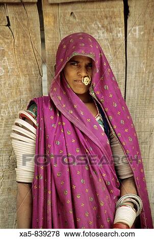 India, Rajasthan, local woman in tradtional dress View Large Photo Image Stock Photo - India, Rajasthan, local woman in tradtional dress. Fotosearch
