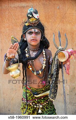 Stock Image - India, Rajasthan, Pushkar, Young sadhu dressed as God Shiva.. Fotosearch