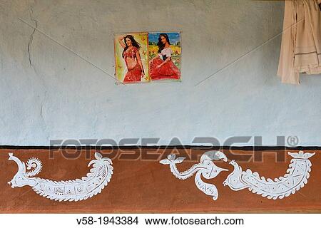 India, Rajasthan, Tonk region, Mandana paintings, Pair of peacocks and Bollywood movie stars posters. View Large Photo Image Picture - India, Rajasthan, Tonk region, Mandana paintings, Pair of peacocks and Bollywood movie stars posters.. Fotosearch