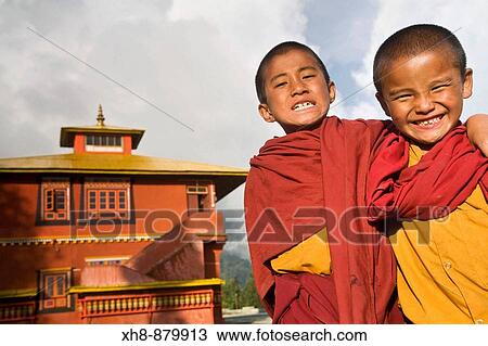 Stock Image - India, Sikkim, Ravangla Rabongla, Karma Theckhling Monastery - a new monastery - made in traditional Sikkim style of stone and mud with Eight corners, Novice monks. Fotosearch