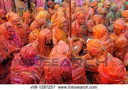 India, Uttar Pradesh, Holi festival, Colour and spring festival celebrating the love between Krishna and Radha. View Large Photo Image Stock Photo - India, Uttar Pradesh, Holi festival, Colour and spring festival celebrating the love between Krishna and Radha.. Fotosearch