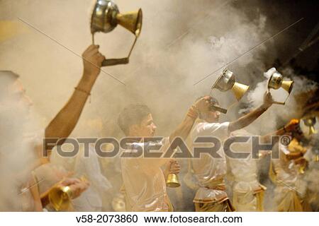 India, Uttar Pradesh, Varanasi, Offering of incense to the Ganges. View Large Photo Image Stock Image - India, Uttar Pradesh, Varanasi, Offering of incense to the Ganges.. Fotosearch