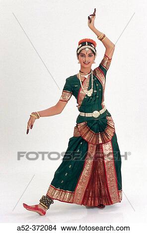 Picture - Indian Bharatnatyam classical dancer in standing pose.. Fotosearch