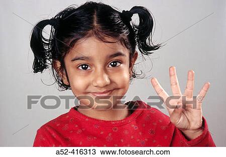 Indian child raising four fingers. View Large Photo Image Stock Image - Indian child raising four fingers.. Fotosearch