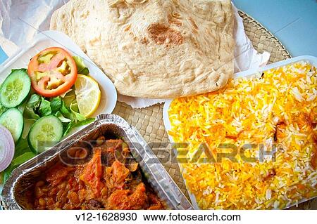 Indian food, Biryani rice with Mutton meat in tomato sauce View Large Photo Image Stock Image - Indian food, Biryani rice with Mutton meat in tomato sauce. Fotosearch