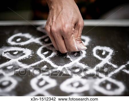 Indian Kolam painter View Large Photo Image Stock Image - Indian Kolam painter. Fotosearch