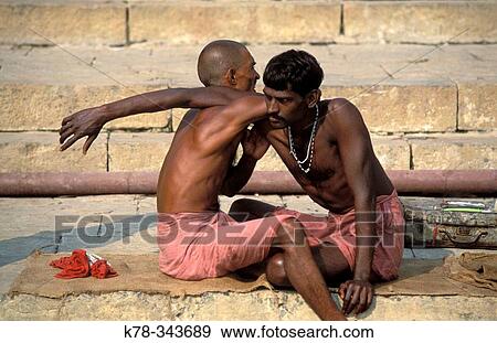 Indian men massaging each other. Varanasi, India View Large Photo Image Stock Photo - Indian men massaging each other. Varanasi, India. Fotosearch