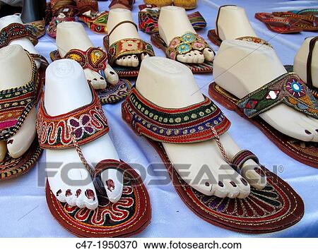 Indian sandals on Sunday street market, Midtown Manhattan, New York City, USA View Large Photo Image Stock Image - Indian sandals on Sunday street market, Midtown Manhattan, New York City, USA. Fotosearch
