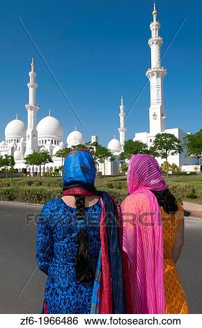 Indian tourist women at Sheikh Zayed Grand Mosque in Abu Dhabi in UAE the world's 8th largest mosque in the world. View Large Photo Image Stock Photograph - Indian tourist women at Sheikh Zayed Grand Mosque in Abu Dhabi in UAE the world's 8th largest mosque in the world.. Fotosearch