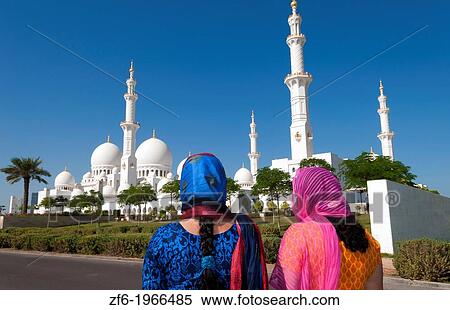 Indian tourist women at Sheikh Zayed Grand Mosque in Abu Dhabi in UAE the world's 8th largest mosque in the world. View Large Photo Image Stock Photography - Indian tourist women at Sheikh Zayed Grand Mosque in Abu Dhabi in UAE the world's 8th largest mosque in the world.. Fotosearch