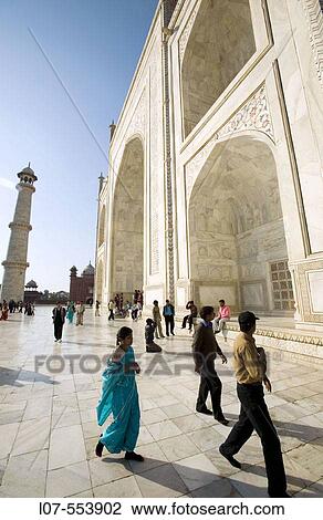 Indian tourists walking in front of the Taj Mahal. Agra. Uttar Pradesh. India View Large Photo Image Stock Image - Indian tourists walking in front of the Taj Mahal. Agra. Uttar Pradesh. India. Fotosearch