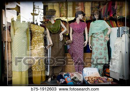 Stock Image - indian village store showcase clothing store in Southall, West London, Borough of Ealing, England, UK. Fotosearch