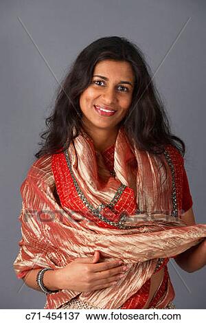 Indian woman in traditional clothing View Large Photo Image Stock Photo - Indian woman in traditional clothing. Fotosearch