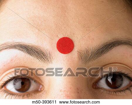Indian woman wearing a bindi. View Large Photo Image Stock Image - Indian woman wearing a bindi.. Fotosearch