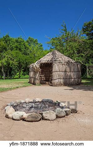 Stock Photo - Indigenous tribe huts, at Centro Ceremonial Indigena de Tibes, Ponce, Puerto Rico. Fotosearch