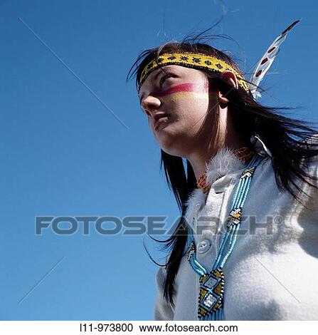 Stock Image - Indigenous woman, america; looking off.. Fotosearch