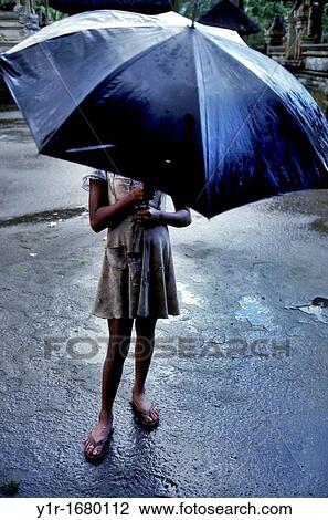 Indonesia, Bali, Girl in Rain View Large Photo Image Stock Image - Indonesia, Bali, Girl in Rain. Fotosearch