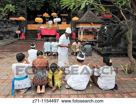 Indonesia, Bali, Goa Lawah Temple, religious ceremony, people, View Large Photo Image Stock Photo - Indonesia, Bali, Goa Lawah Temple, religious ceremony, people,. Fotosearch