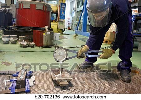 Stock Photograph - Induction furnace used to melt aluminium, study of composite materials, procedure for manufacturing metal, Automotive industry Unit. Fundaci? n Inasmet-Tecnalia, Centro de Investigaci? n, Parque Tecnologico de San Sebastian, Donostia, Gipuzkoa, Euskadi.. Fotosearch