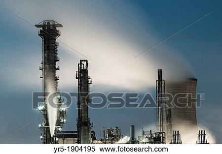 Industrial cooling tower at dusk View Large Photo Image Stock Photography - Industrial cooling tower at dusk. Fotosearch