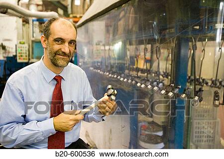 Industrial director. Hammer manufacture. View Large Photo Image Stock Photograph - Industrial director. Hammer manufacture.. Fotosearch
