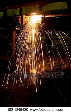 Stock Image - industrial machine laser cutting iron, Sevilla. Fotosearch